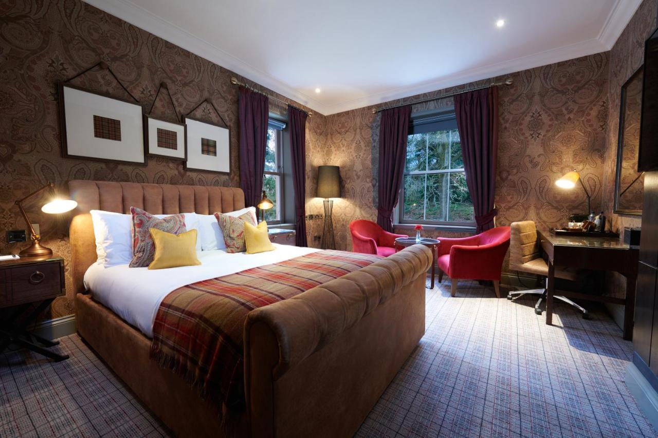 Cameron House On Loch Lomond Алекзандрия Экстерьер фото A bedroom at The Grove
