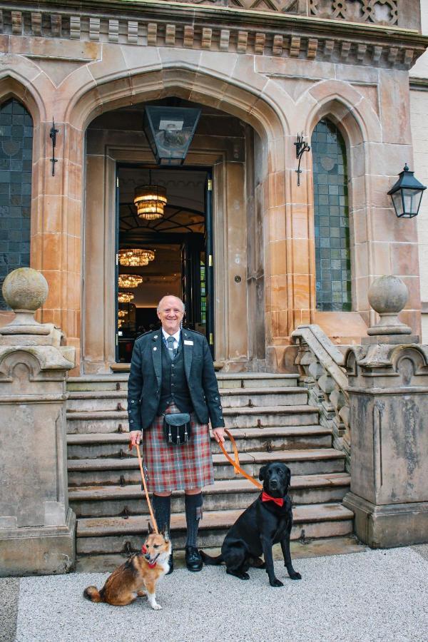 Cameron House On Loch Lomond Алекзандрия Экстерьер фото A Scottish doorman in traditional kilt